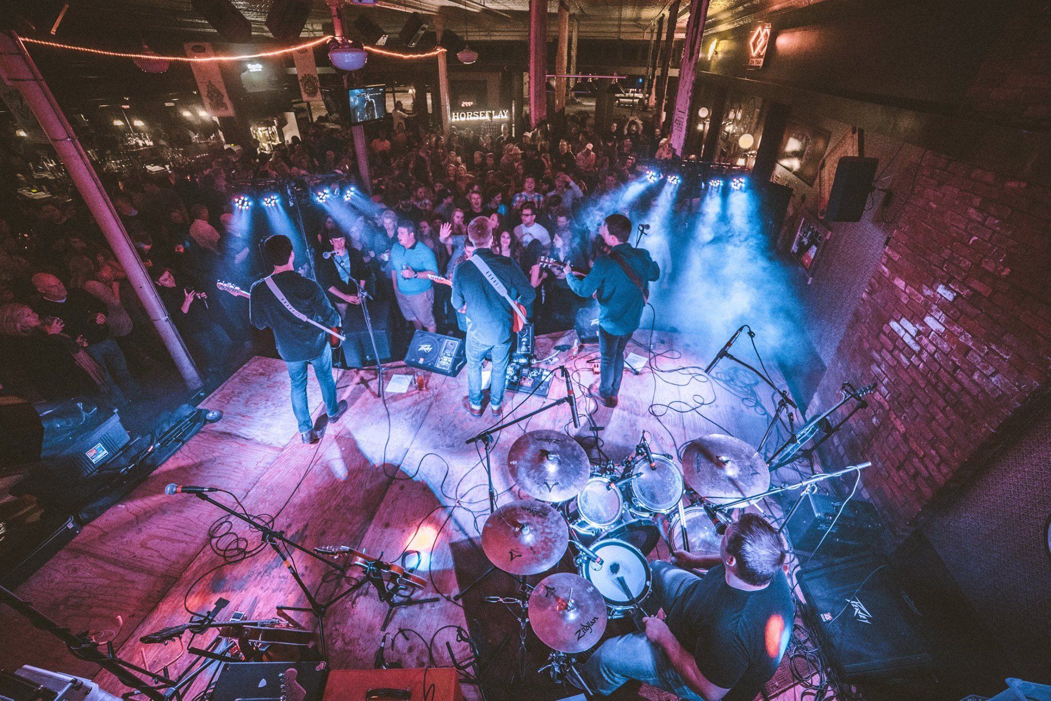 Horseplay performing live, crowd packed in front of the stage